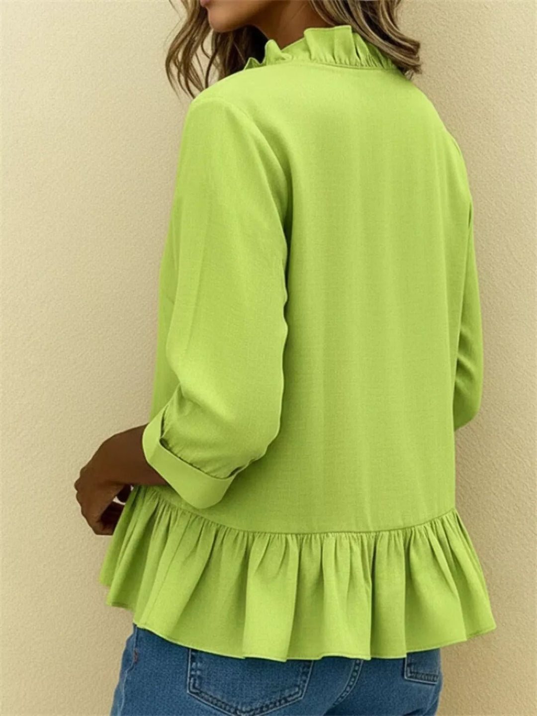 Ruffle front peplum hem relaxed v-neck in yellow-green, back view