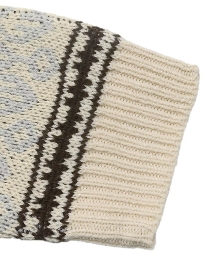 Crew neck ribbed trim relaxed fit in apricot color, close-up detail 3