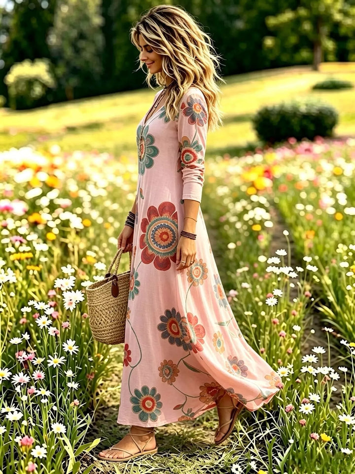 Dusty pink maxi dress worn on a model, showing the V-neck again