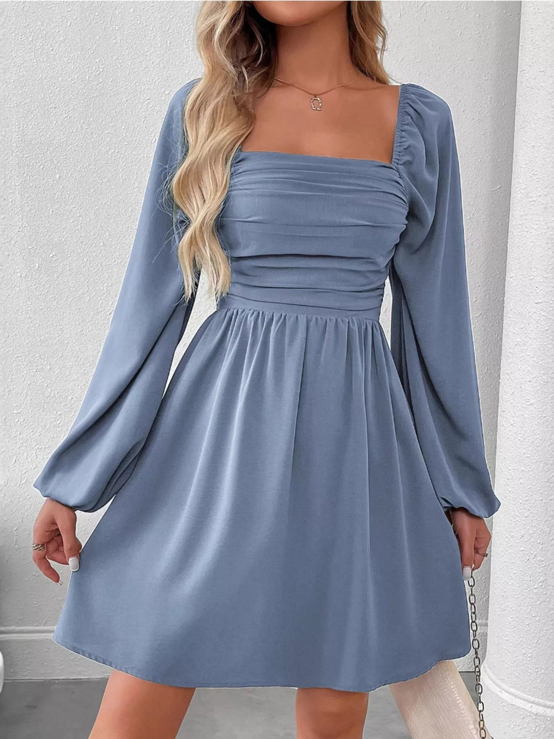 Blue mini dress front view with square neckline