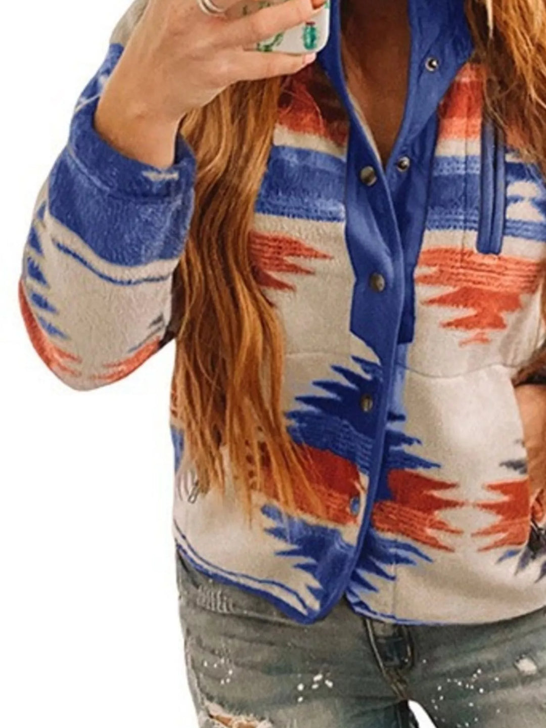 Close-up of the royal blue snap placket and Aztec print sleeve