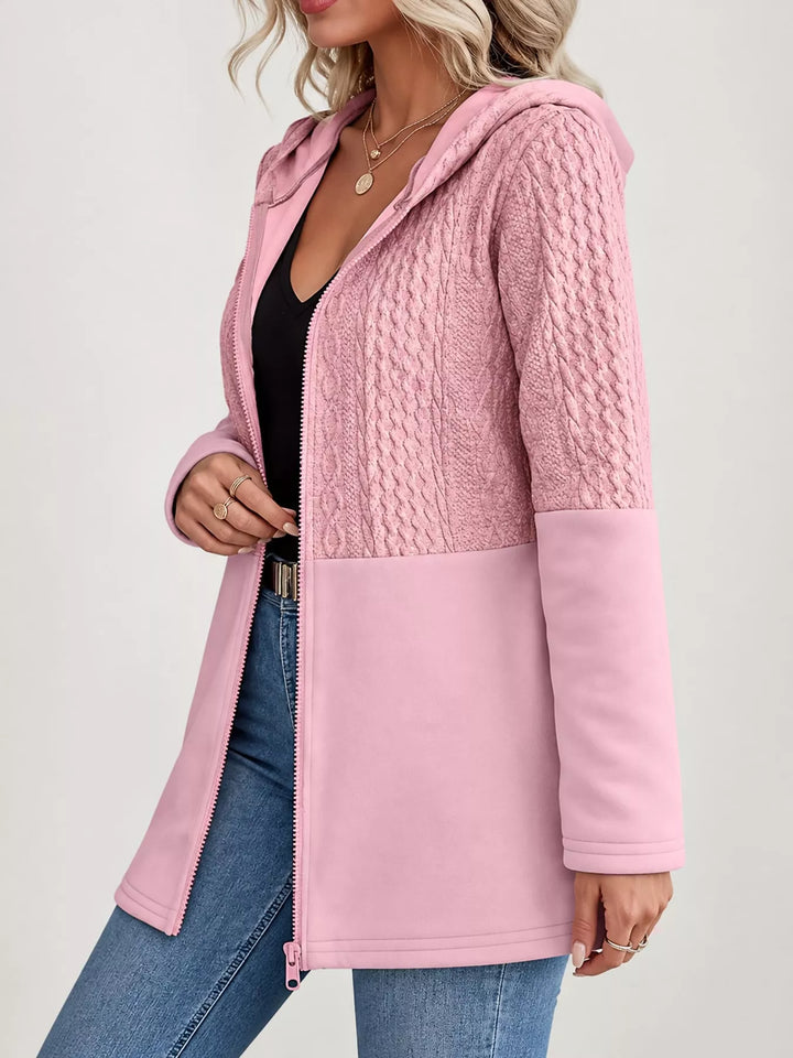Hooded zip front cable knit colorblock in pink, styled on model