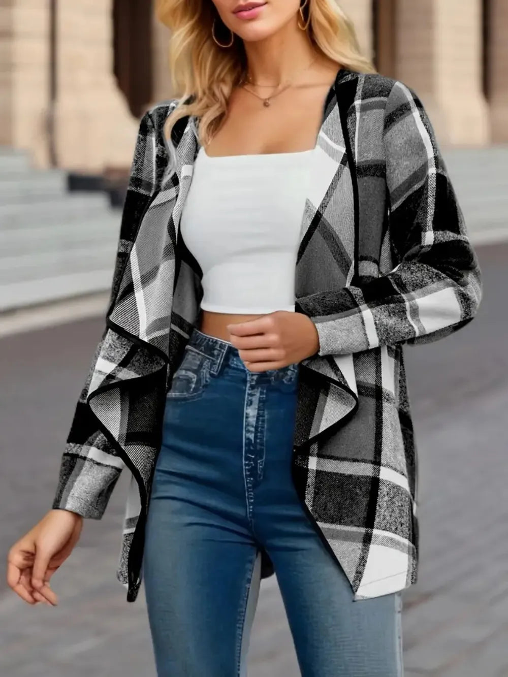 Black white plaid open front jacket with long draped front panels, styled with denim