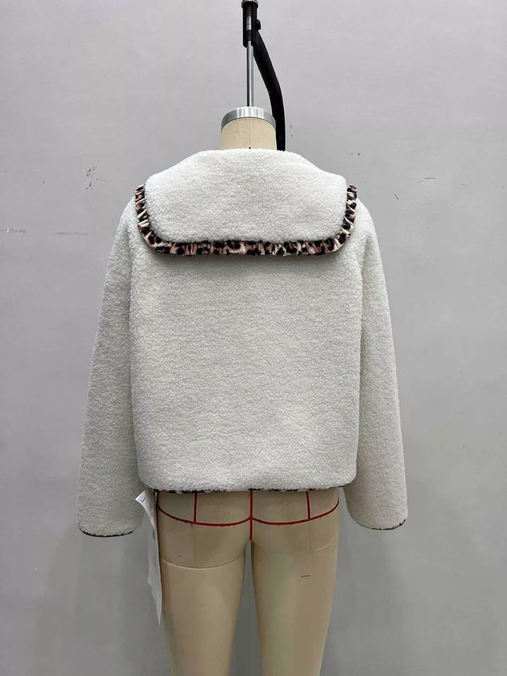 Cream plush jacket back view on a mannequin showing the wide collar