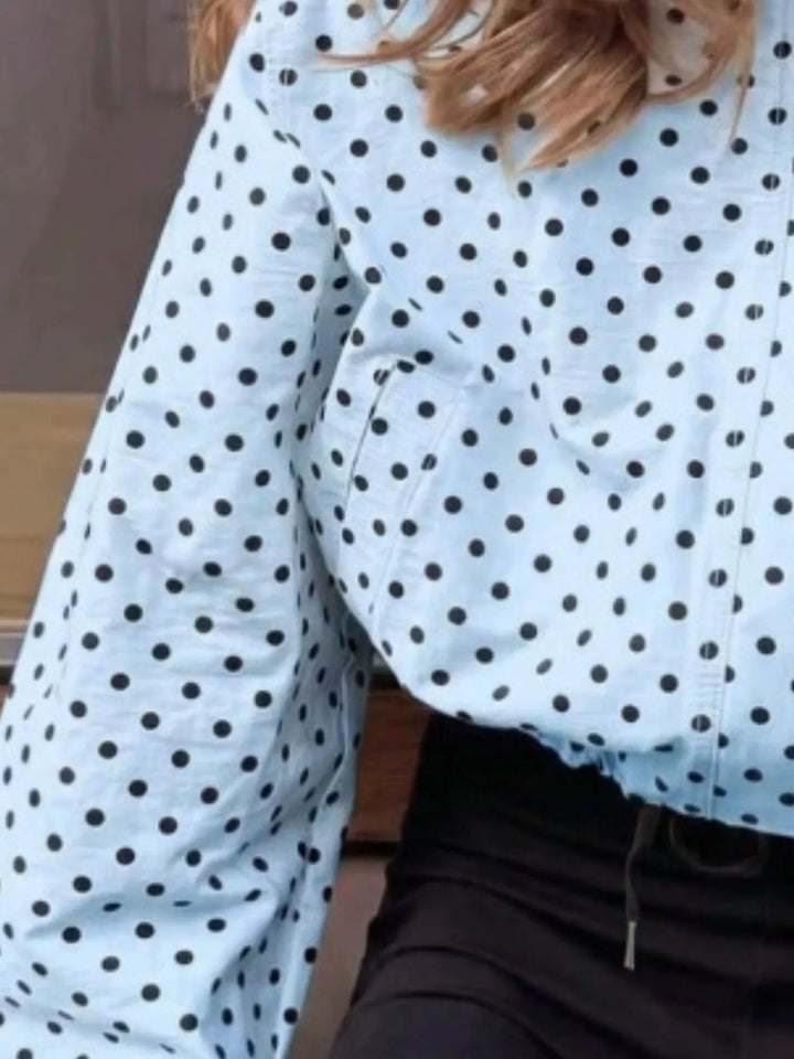 Polka dot zip front stand collar cropped in blue, close-up detail 2