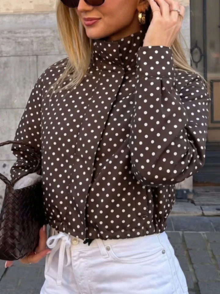 Polka dot zip front stand collar cropped in brown, front view