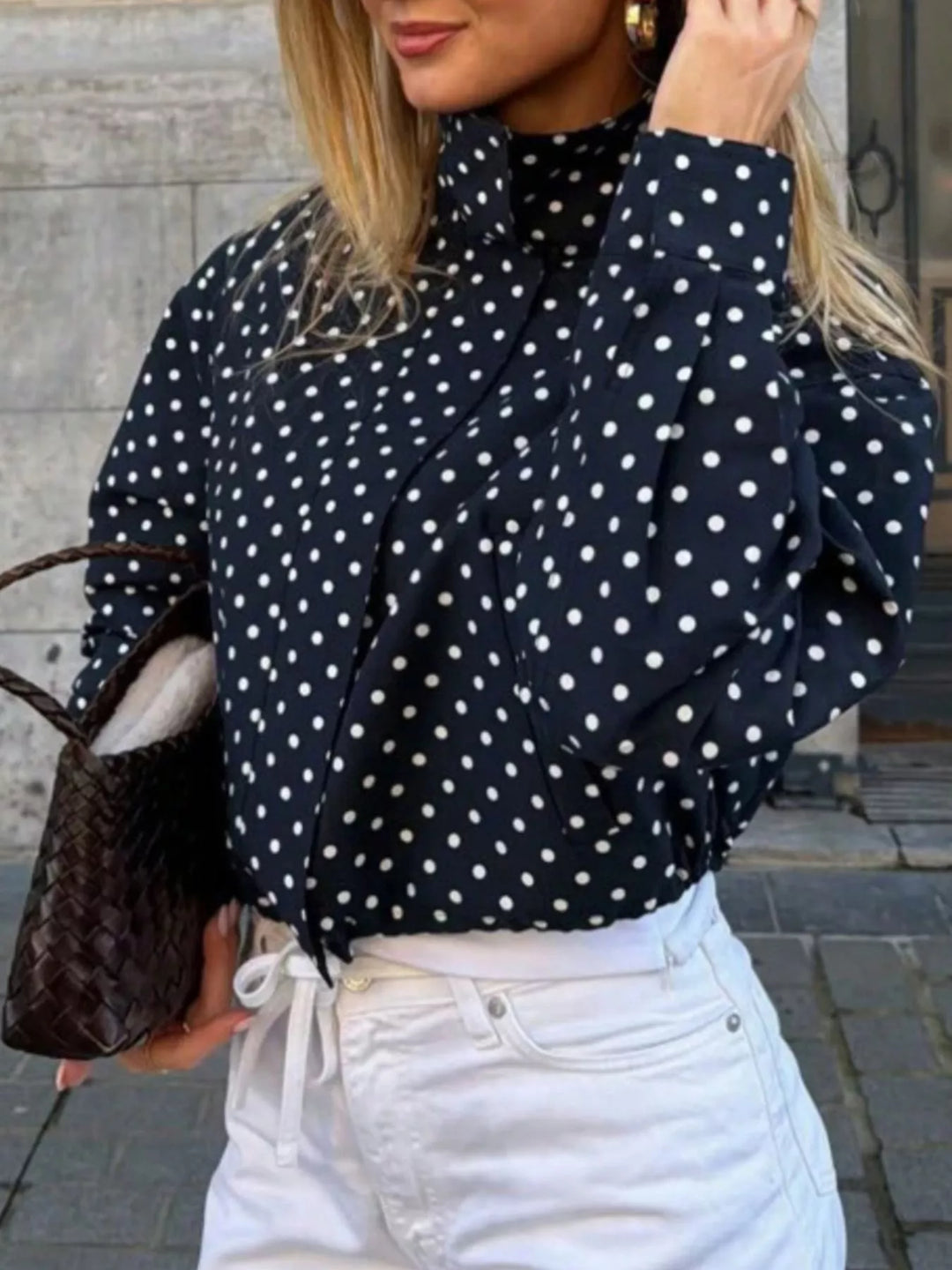 Polka dot zip front stand collar cropped in navy blue, front view