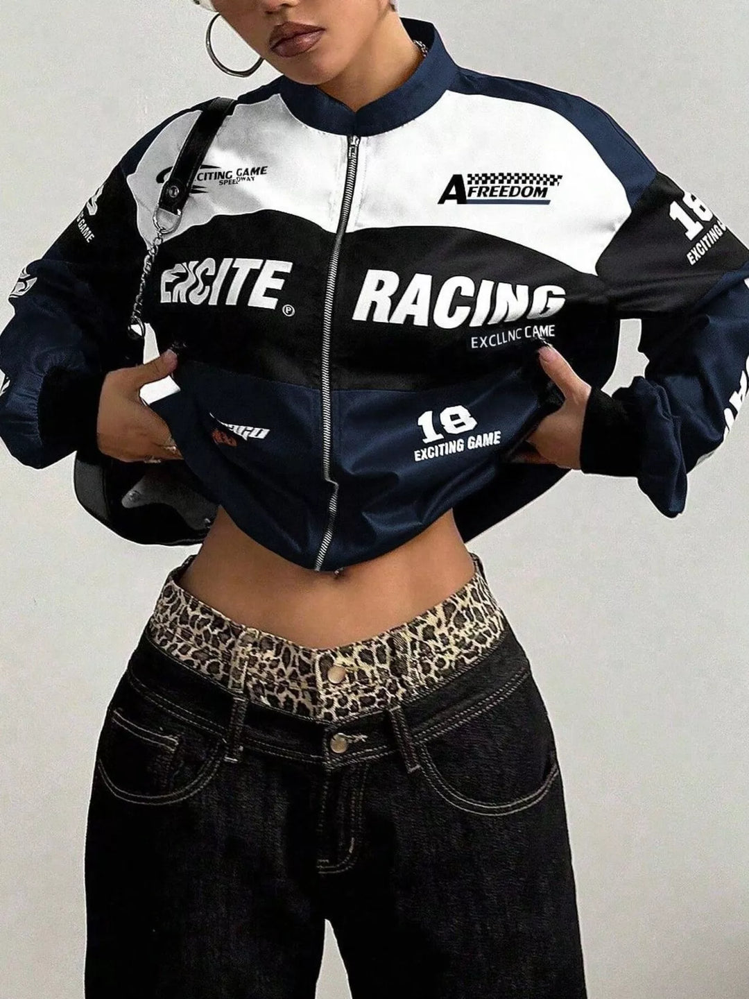 Racing letter print cropped bomber in navy blue, styled on model 2