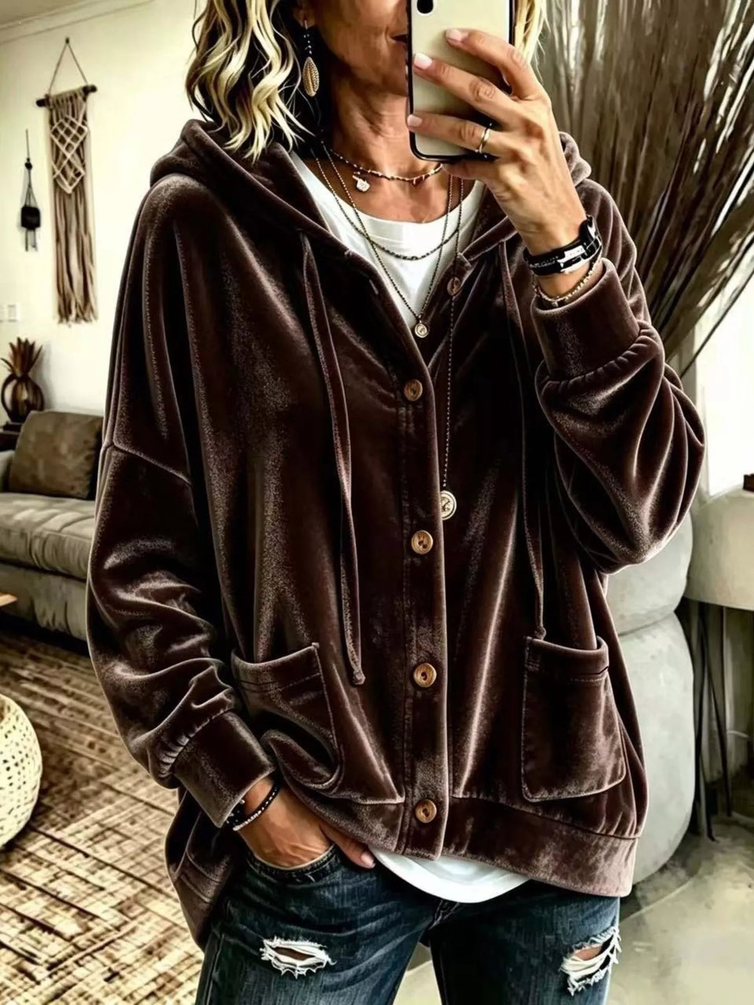 Chocolate brown velvet-look hooded jacket buttoned up over a white tee