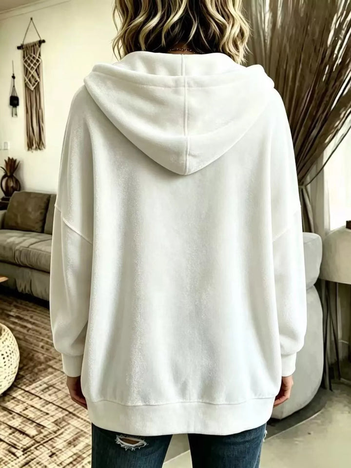 Back view of the white hooded jacket showing the relaxed hood