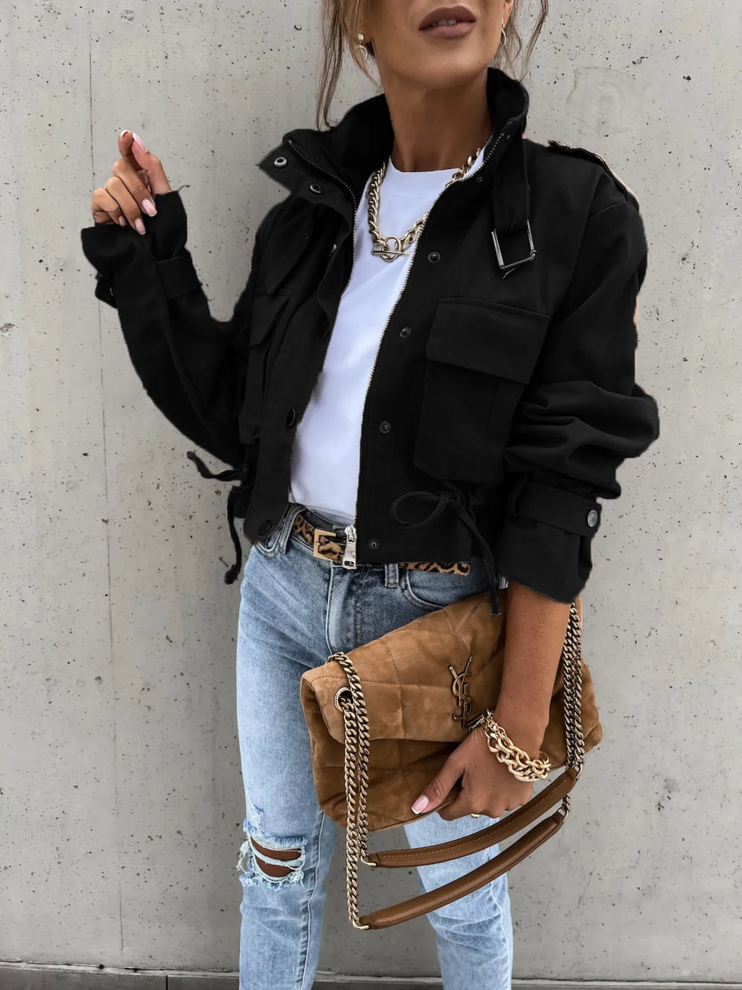 Snap front cropped flap pockets in black, front view