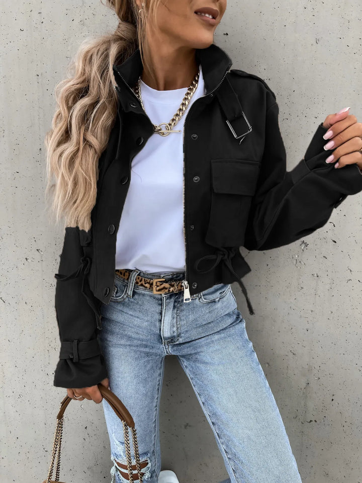 Snap front cropped flap pockets in black, styled on model