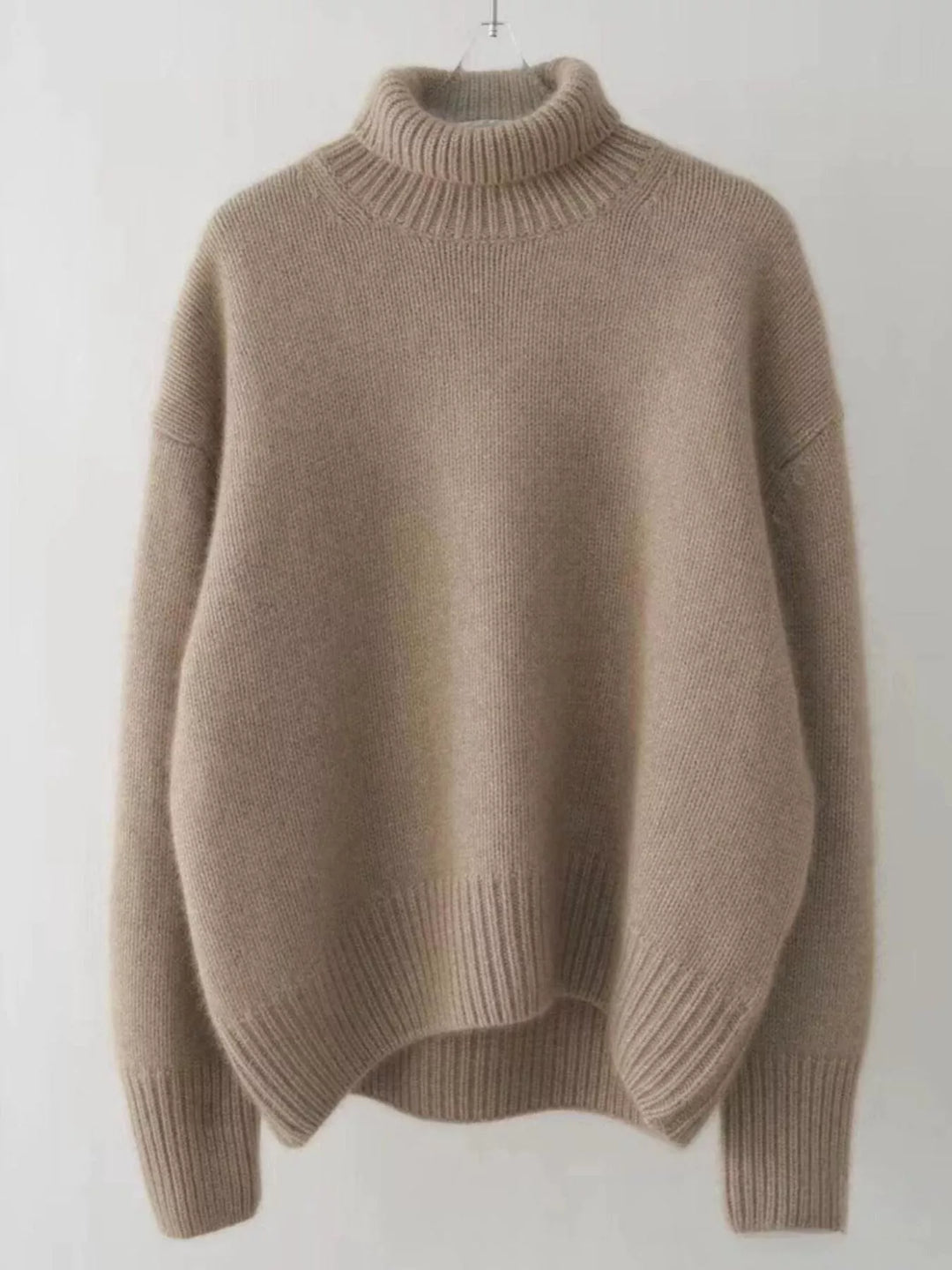 Mocha fuzzy turtleneck sweater laid flat, front view