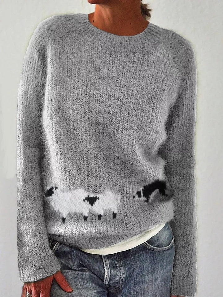 Gray round neck sweater with sheep motif and raglan sleeves, front view
