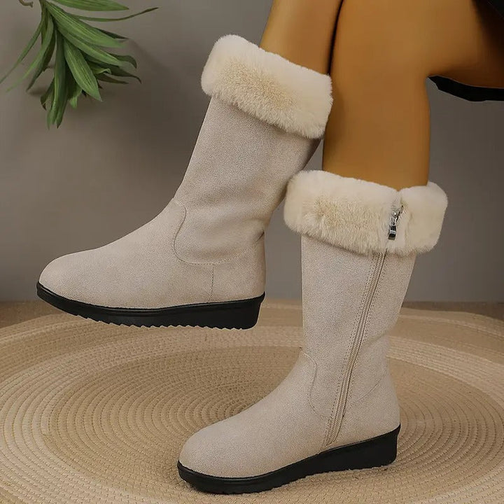 Cream mid calf boots with fluffy faux fur cuff and inner zip