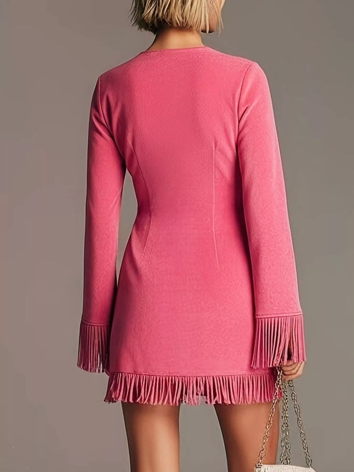 Hot pink mini dress back view showing the suede-look fabric