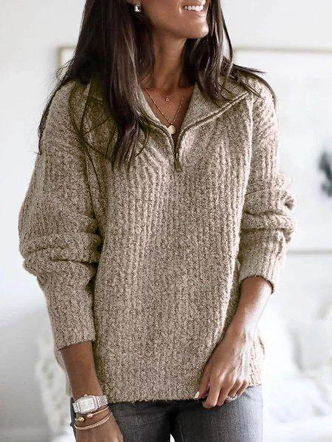 Beige half zip ribbed knit sweater with a relaxed fit, front view
