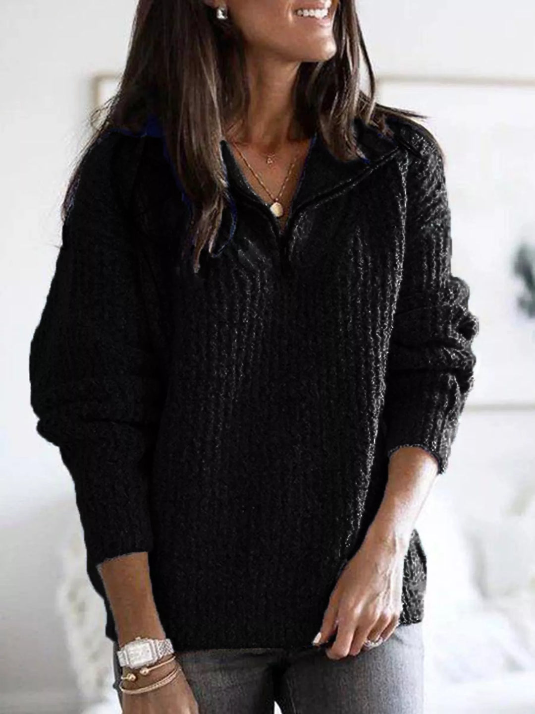 Black half zip ribbed knit sweater with a relaxed fit, front view