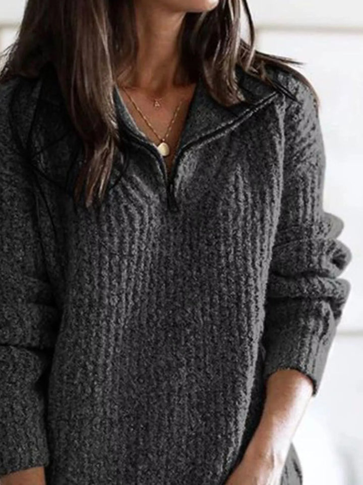 Charcoal half zip knit sweater close-up of the zip neckline