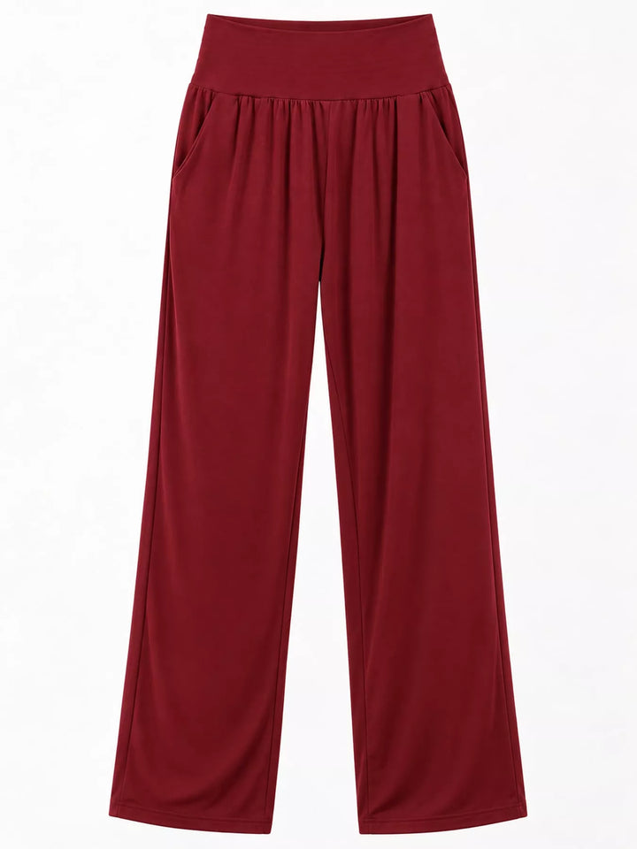 Burgundy high waisted wide leg pants, laid flat showing the full length