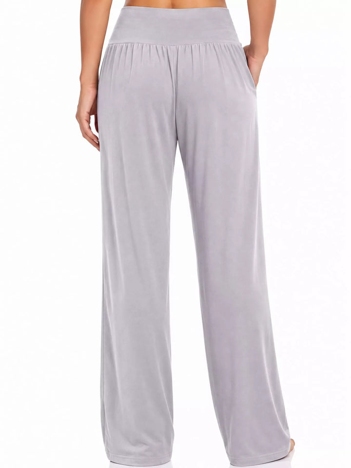 Light gray high waisted wide leg pants, back view of the gathered waistband