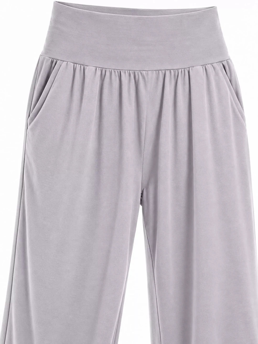 Light gray high waisted wide leg pants, close-up of the wide waistband and pocket