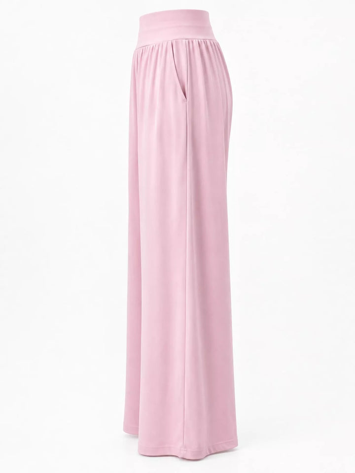 Light pink high waisted wide leg pants, flat side view of the wide leg