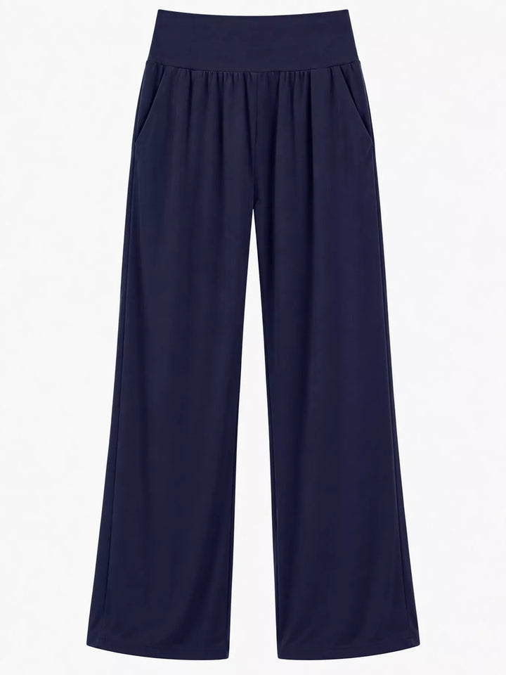 Navy high waisted wide leg pants, laid flat with the smocked waistband