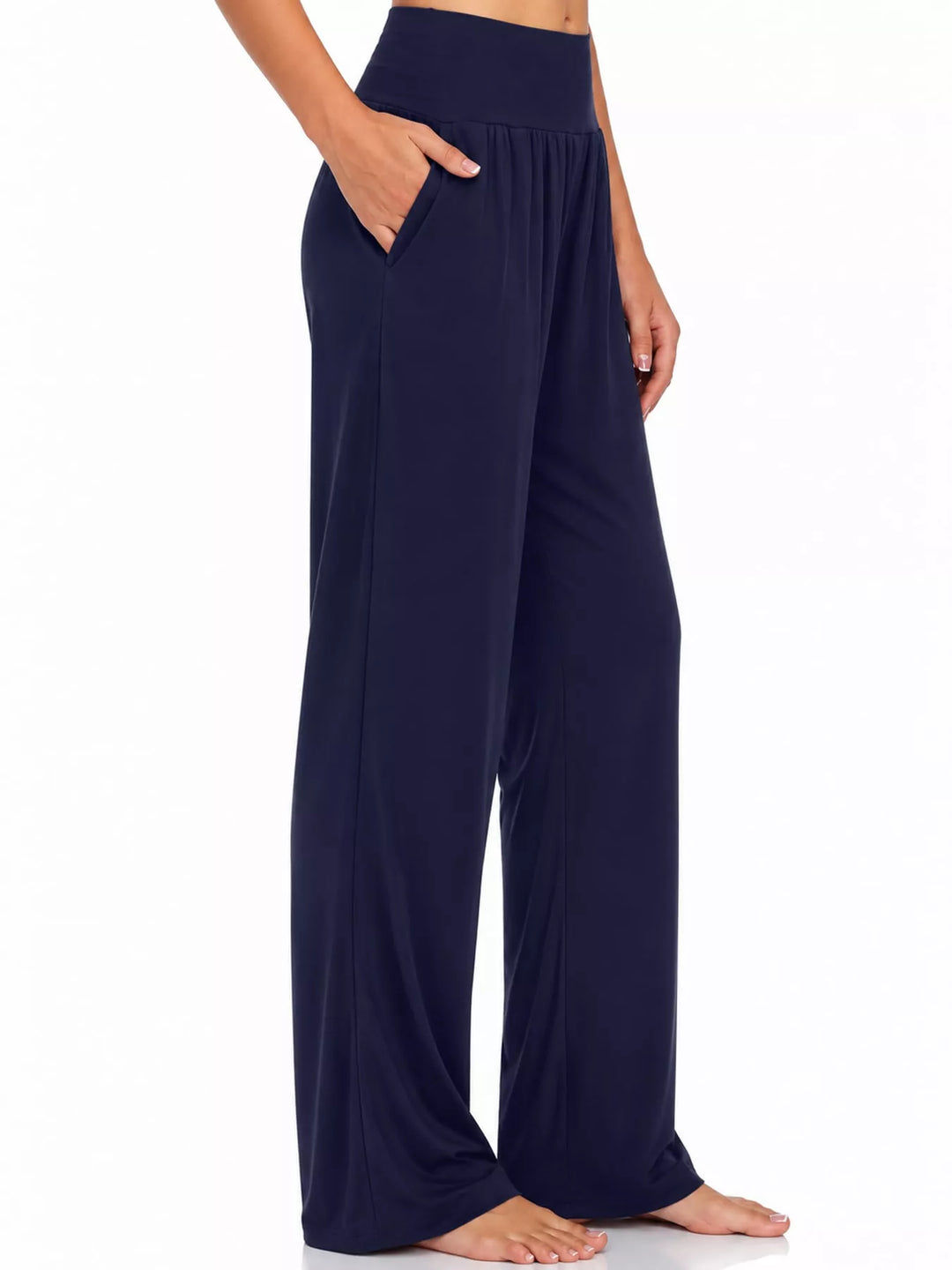 Navy high waisted wide leg pants, side view showing the pocket and relaxed leg