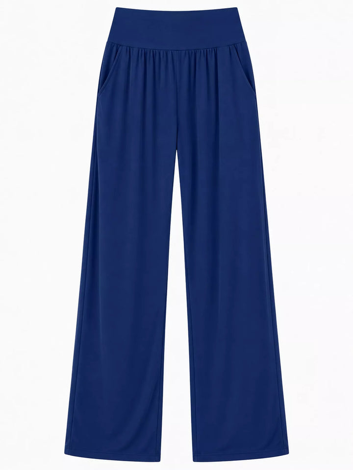 Royal blue high waisted wide leg pants, laid flat showing the wide leg opening