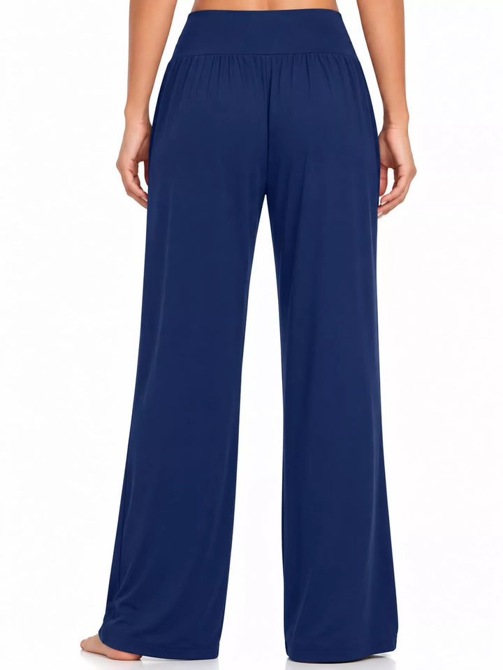 Royal blue high waisted wide leg pants, front view with hands resting at the sides