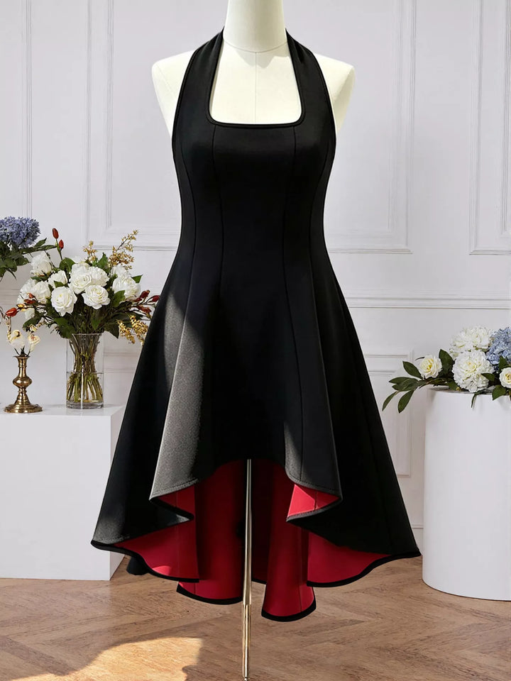 Black midi dress shown flat with halter neck with tie