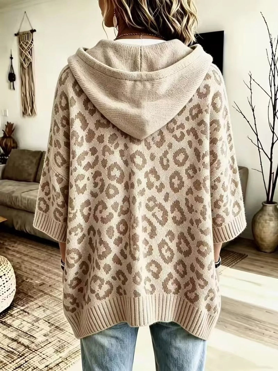 Back view of the beige leopard jacquard hooded sweater