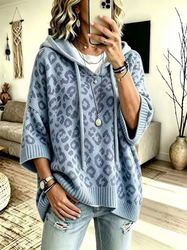 Dusty blue leopard jacquard hooded sweater with a drawstring, front view