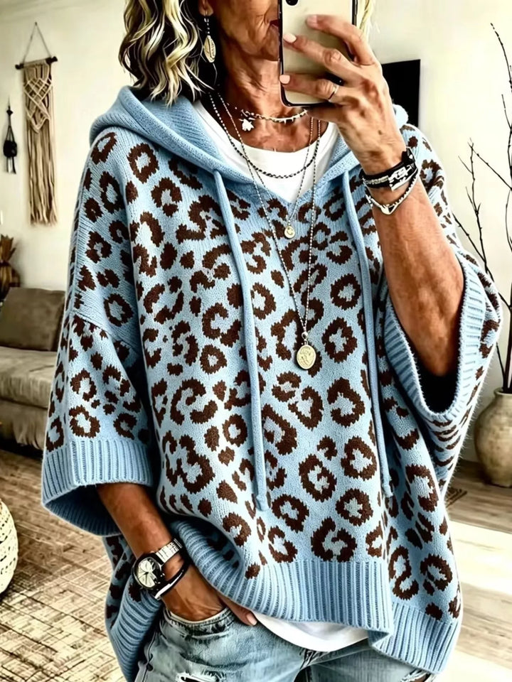Sky blue leopard jacquard hooded sweater with drawstring, front view