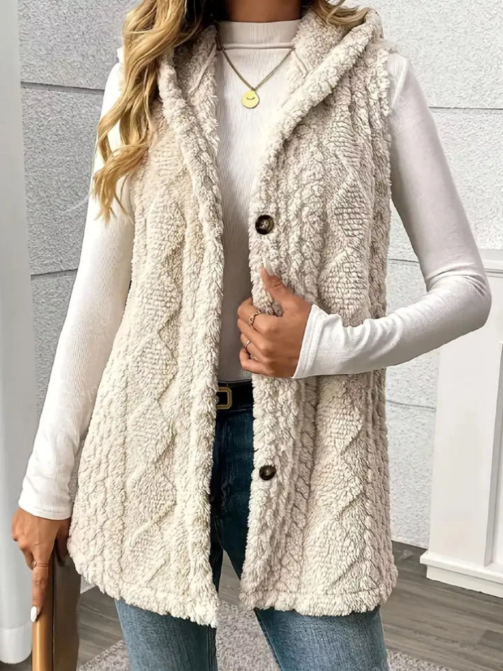 Women's hooded vest in cream, longline fluffy cable knit button up, front view