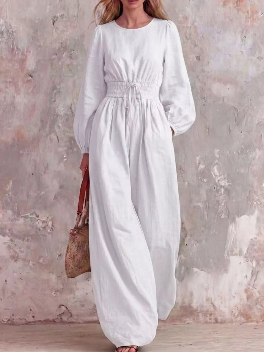 White wide leg jumpsuit with long balloon sleeves, full length front view