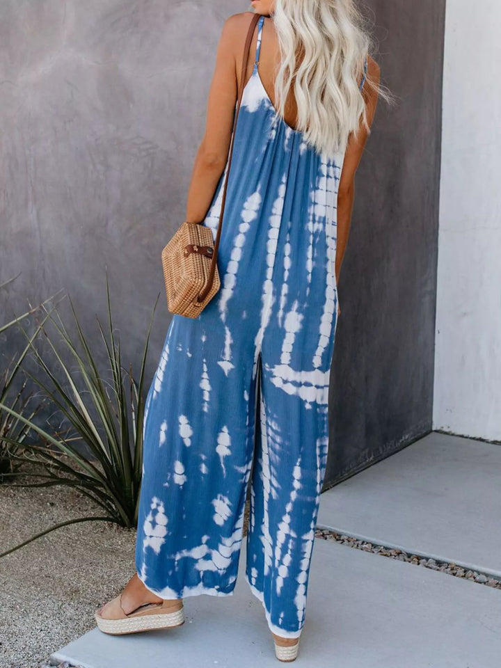 Back view of the blue tie dye jumpsuit with thin straps