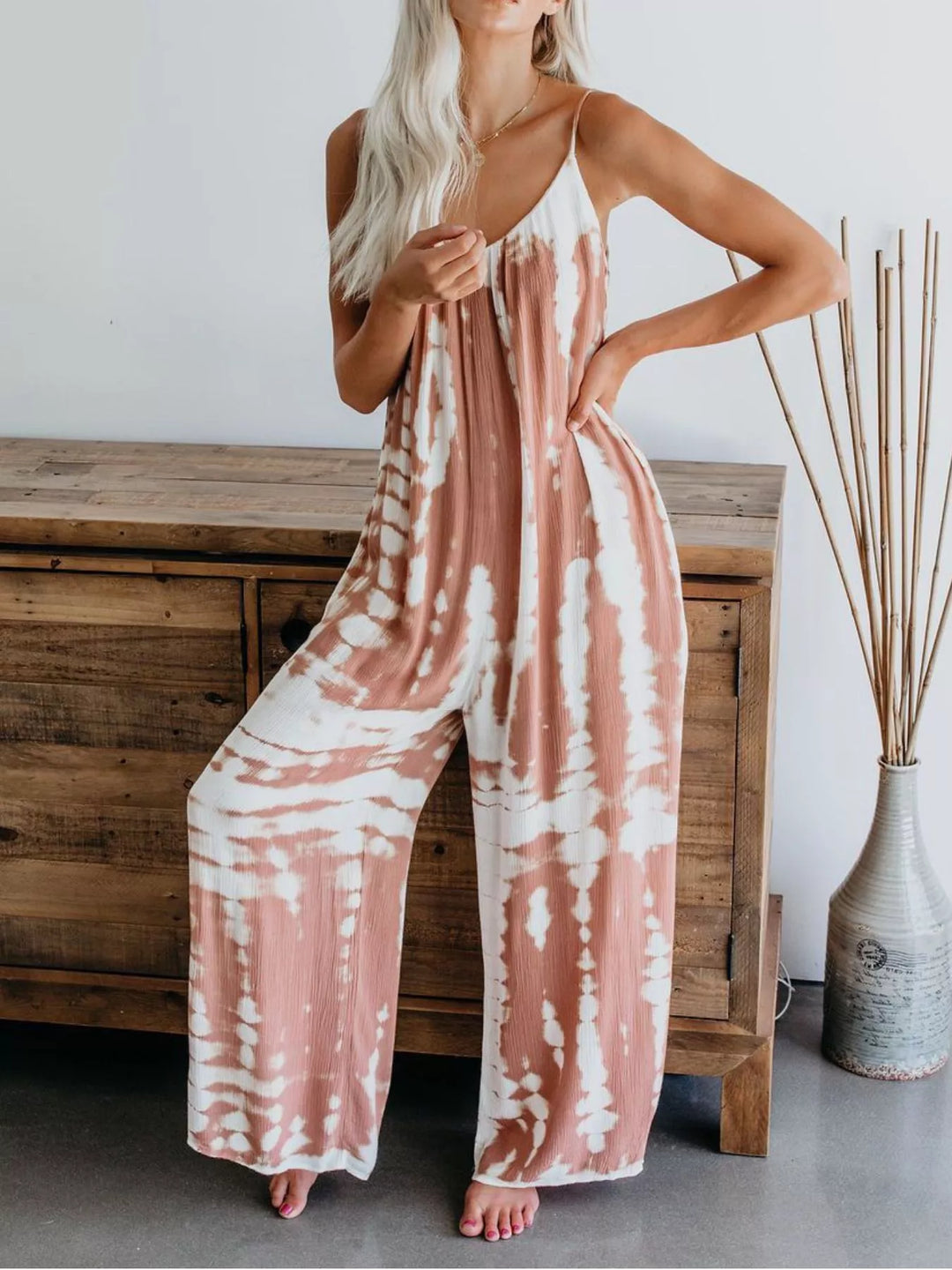 Coral wide leg jumpsuit with spaghetti straps, front standing pose