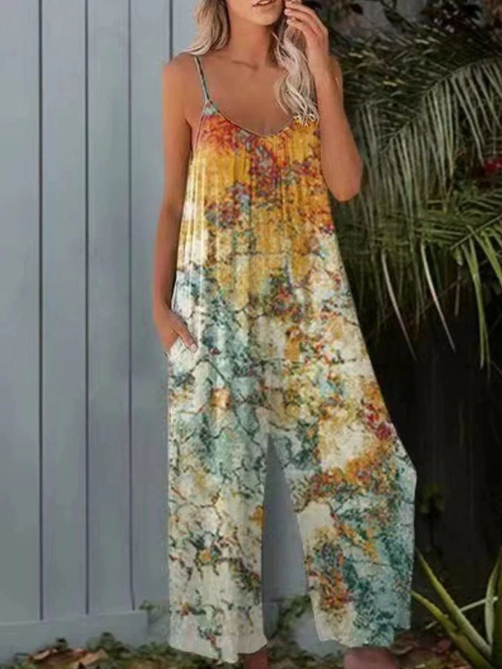 Yellow floral jumpsuit with spaghetti straps and wide legs, front view