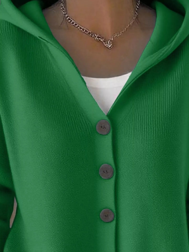 Close-up of the green cardigan hood and V neckline