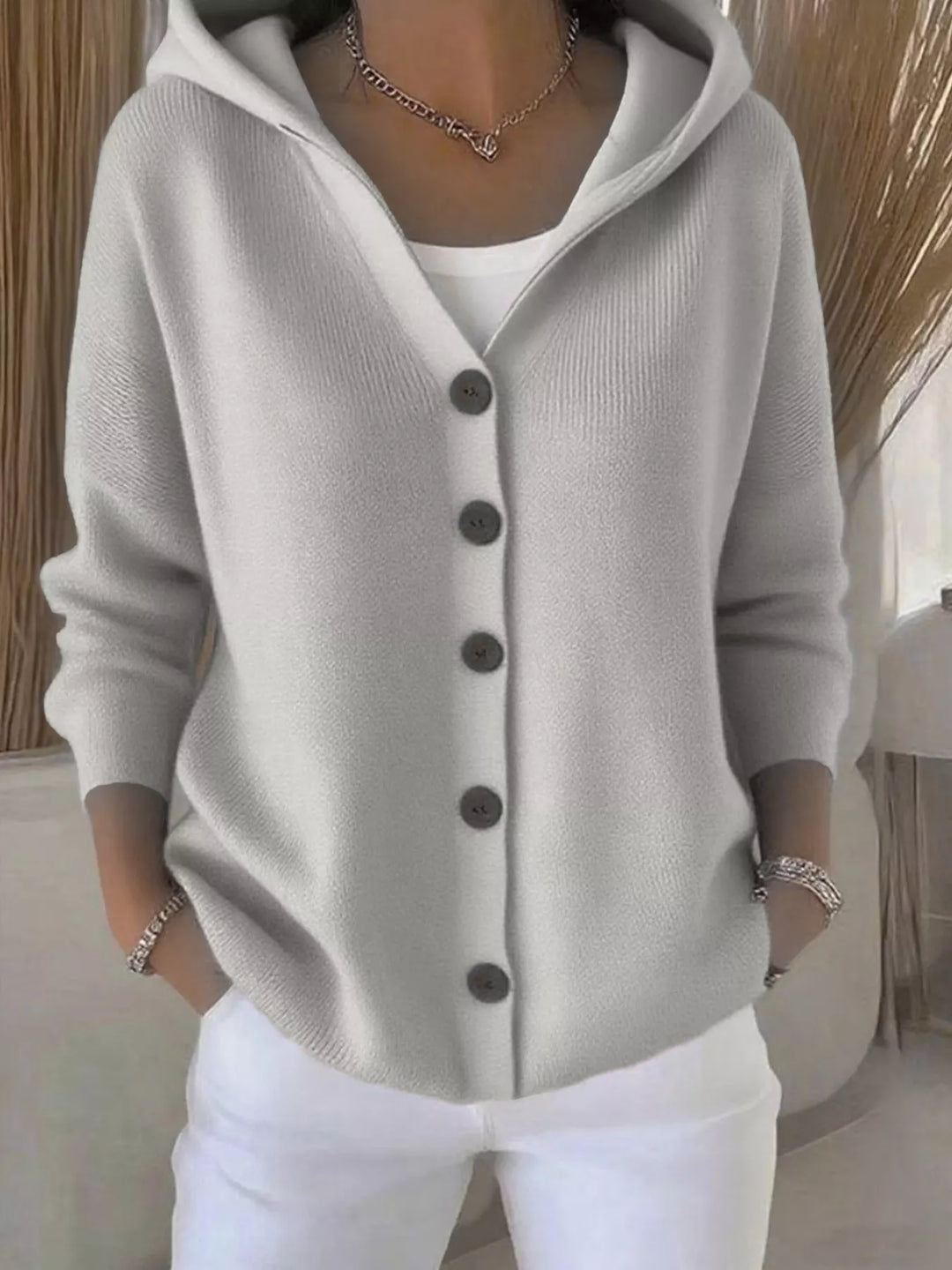 Light gray hooded knit cardigan with wooden-look buttons, front view