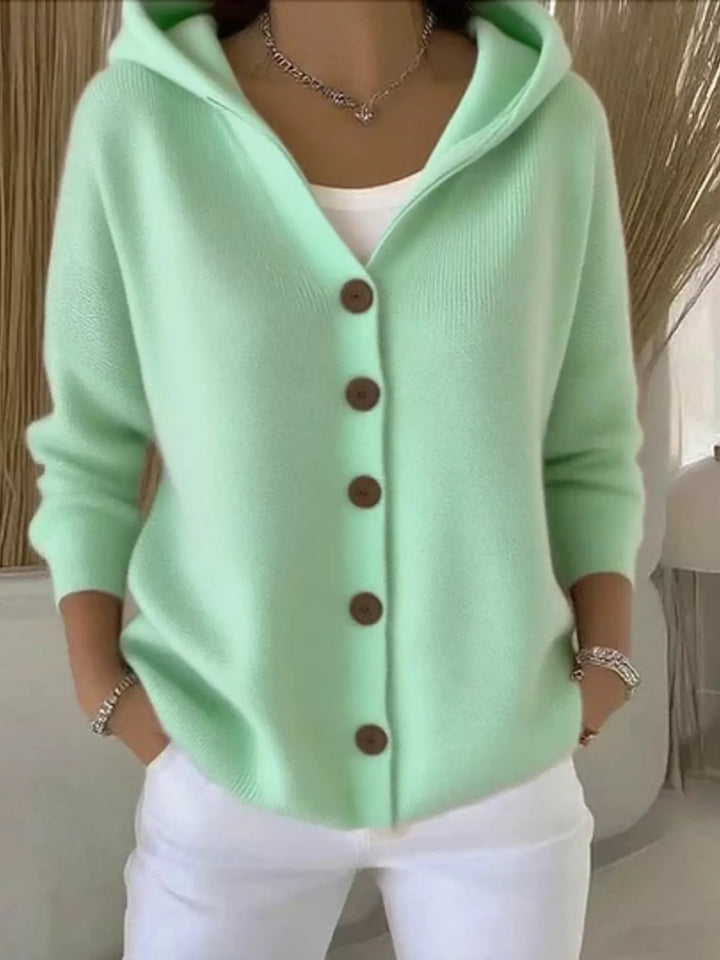 Mint green hooded knit cardigan with wooden-look buttons, front view