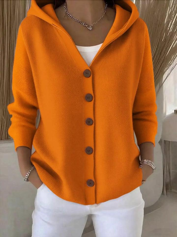Orange hooded knit cardigan with wooden-look buttons, front view