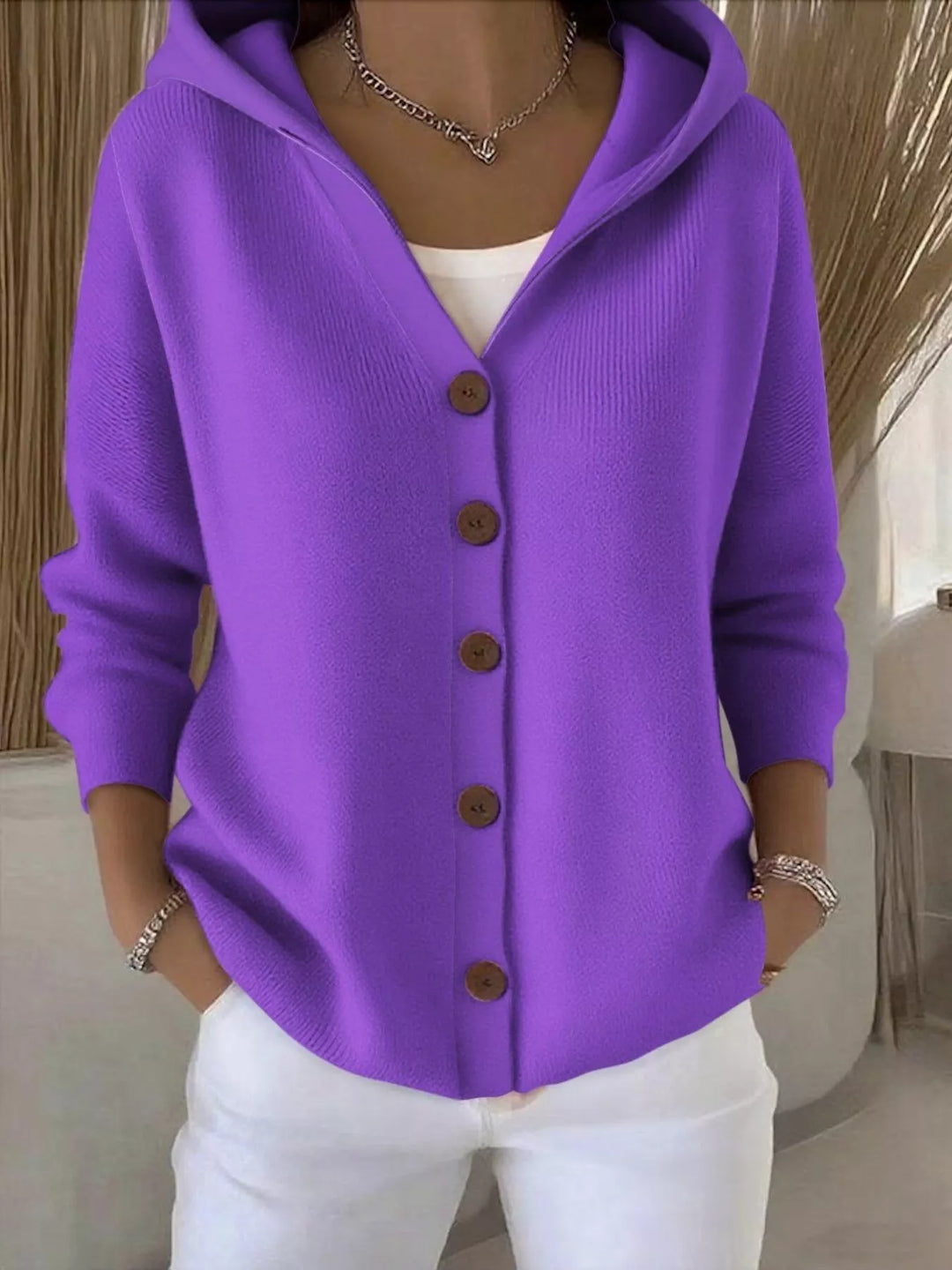 Purple hooded knit cardigan with wooden-look buttons, front view