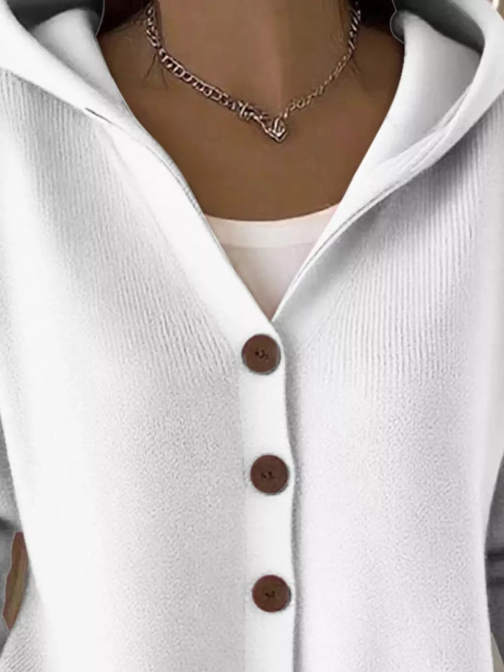 Close-up of the white cardigan hood and V neckline