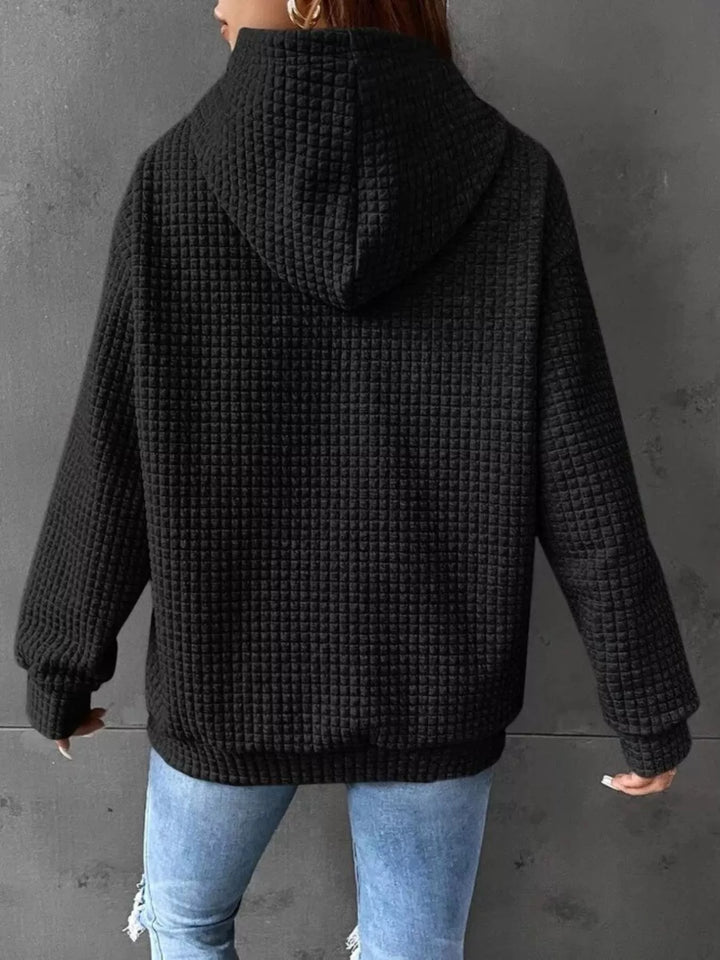 Waffle texture kangaroo pocket drawstring hood in black, back view