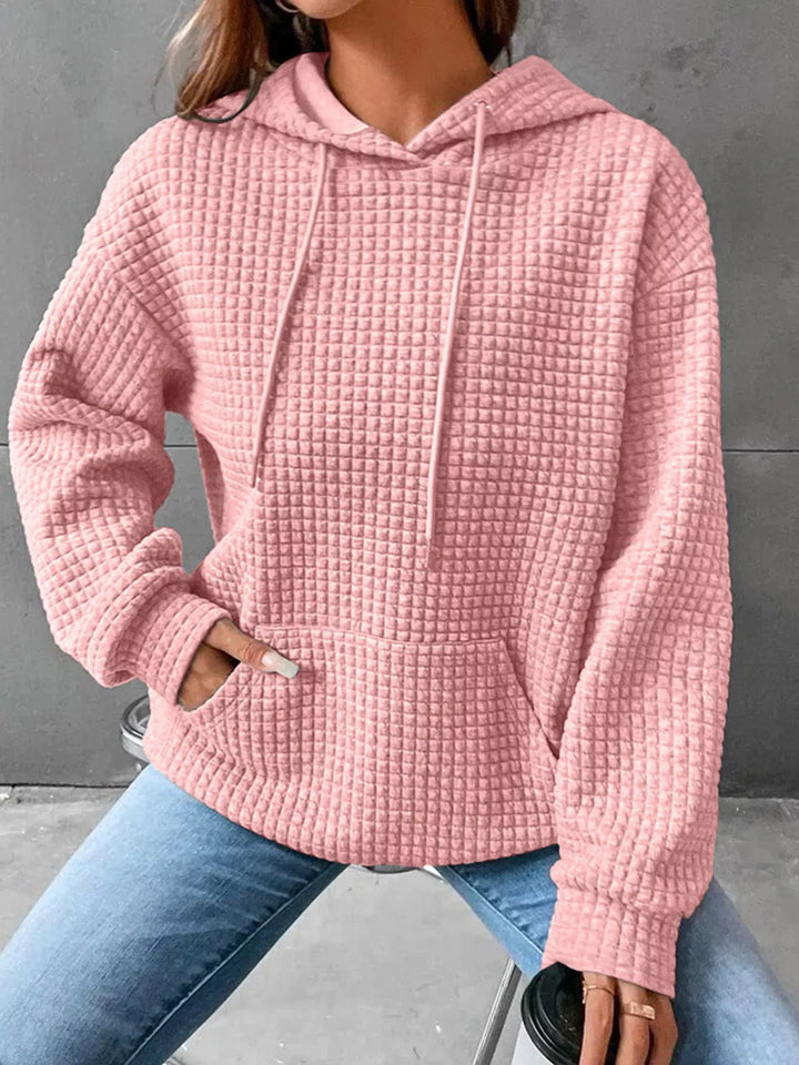Waffle texture kangaroo pocket drawstring hood in pink, front view