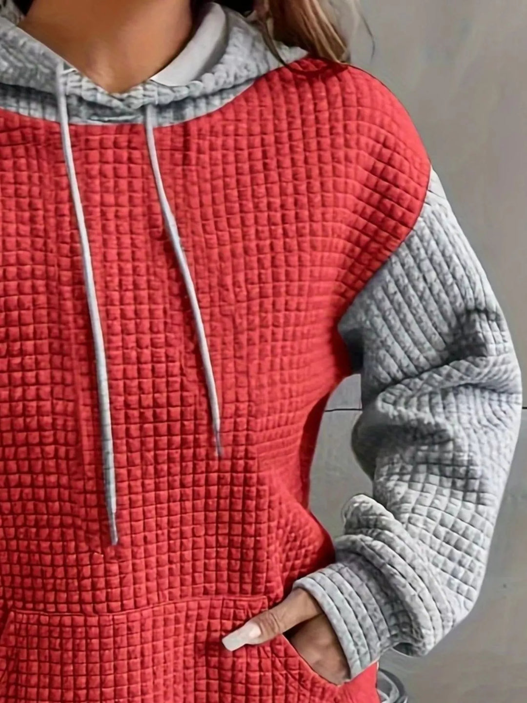 Waffle texture kangaroo pocket drawstring hood in red/gary, close-up detail