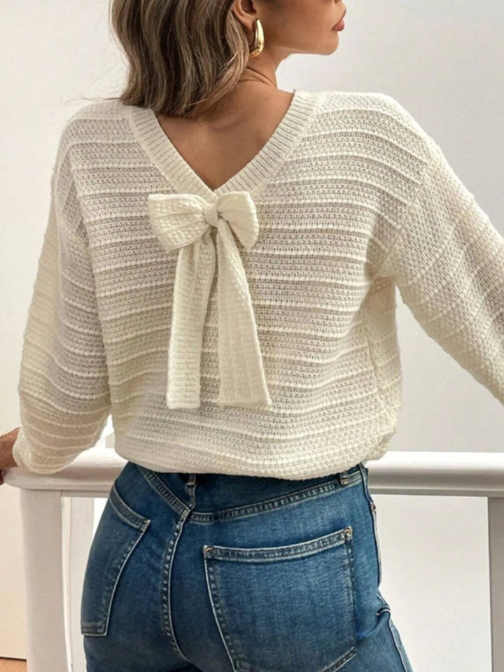 Women's knit sweater in beige, bow detail open v back textured